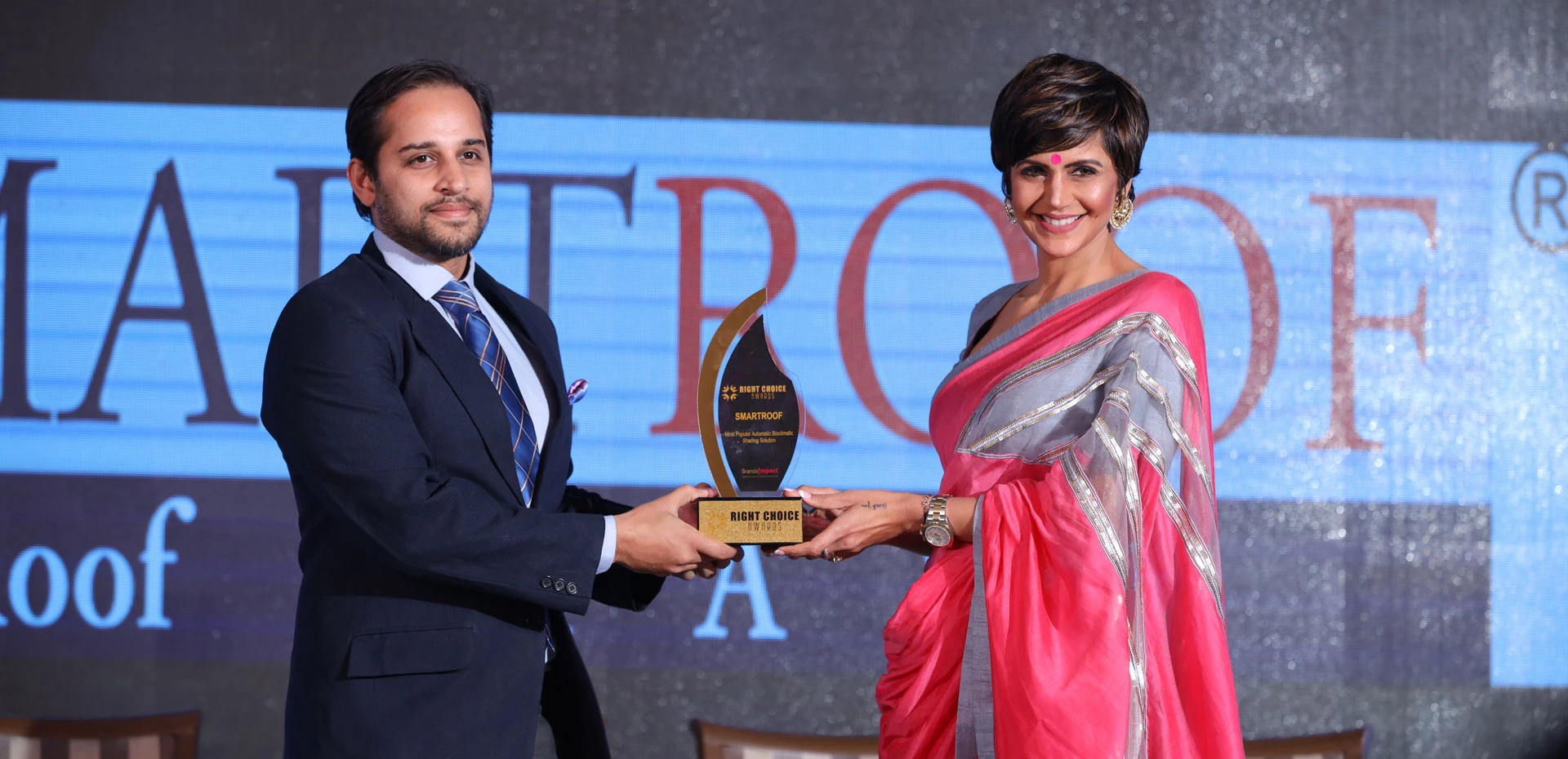 Mandira Bedi Giving Award in Rightchoice Award Function.